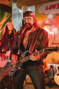 Michel Montecrossa with electric guitar